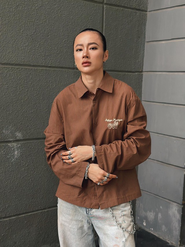 Angela Phương Trinh với yết hầu rõ nét Angela Phương Trinh với phần cổ và yết hầu nổi bật